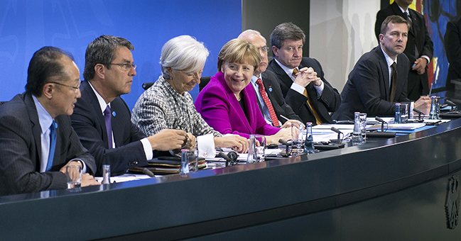 Angela Merkel and the heads of leading economic and financial organisations