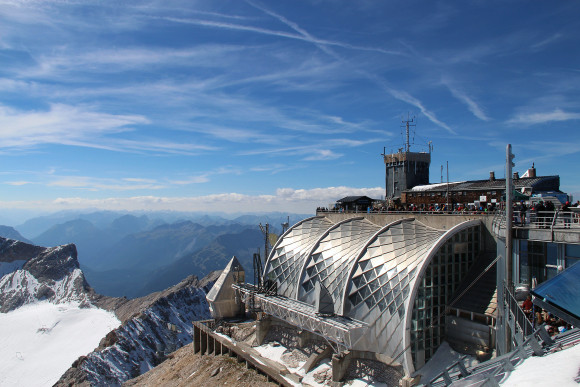 Meteorological station and terrace with visitors at the top of the Zugspitze