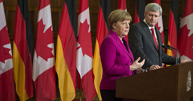 Chancellor Angela Merkel and Canada's Prime Minister Stephen Harper at the press conference